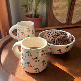 Berry Berry mug and bowl set styled for breakfast and coffee moments.