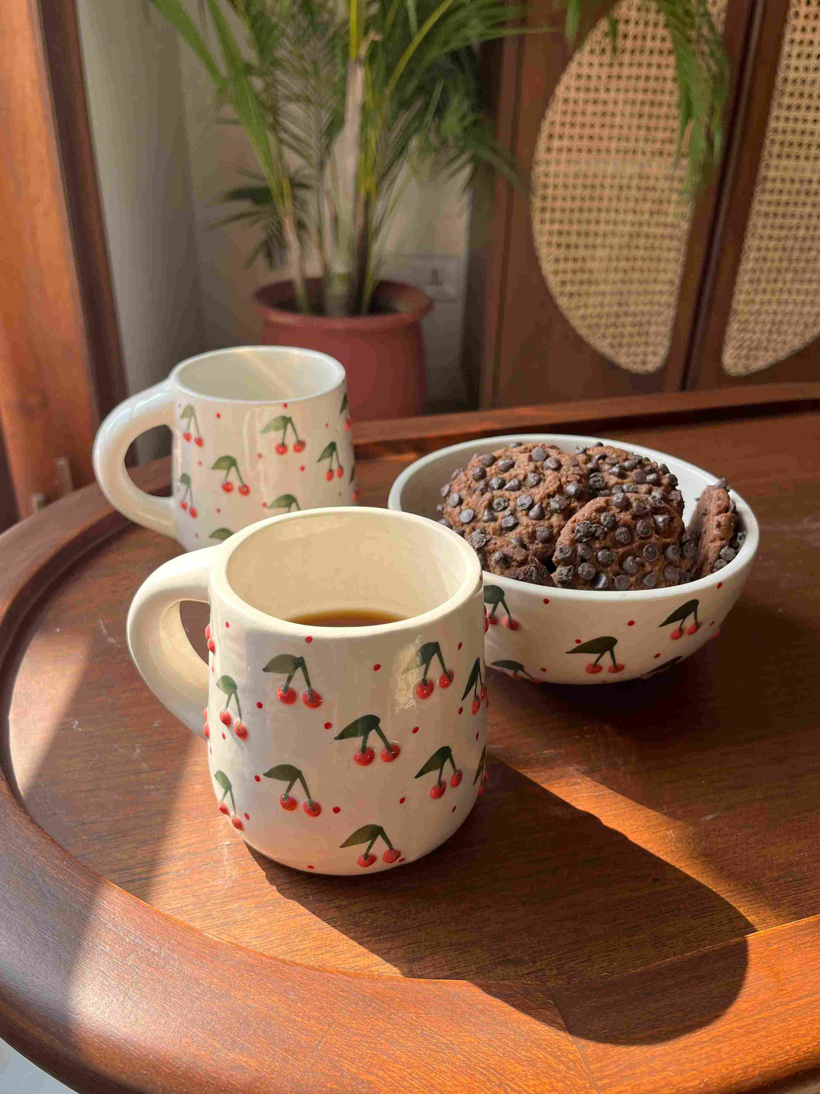 Berry Berry mug and bowl set styled for breakfast and coffee moments.