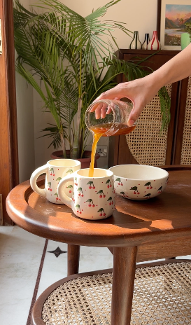Berry Berry mug and bowl set used for serving coffee, tea, and snacks.