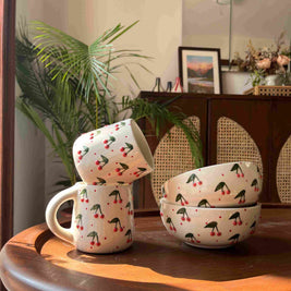 Berry Berry Mug and Bowl Set featuring two ceramic mugs and two matching ceramic bowls.