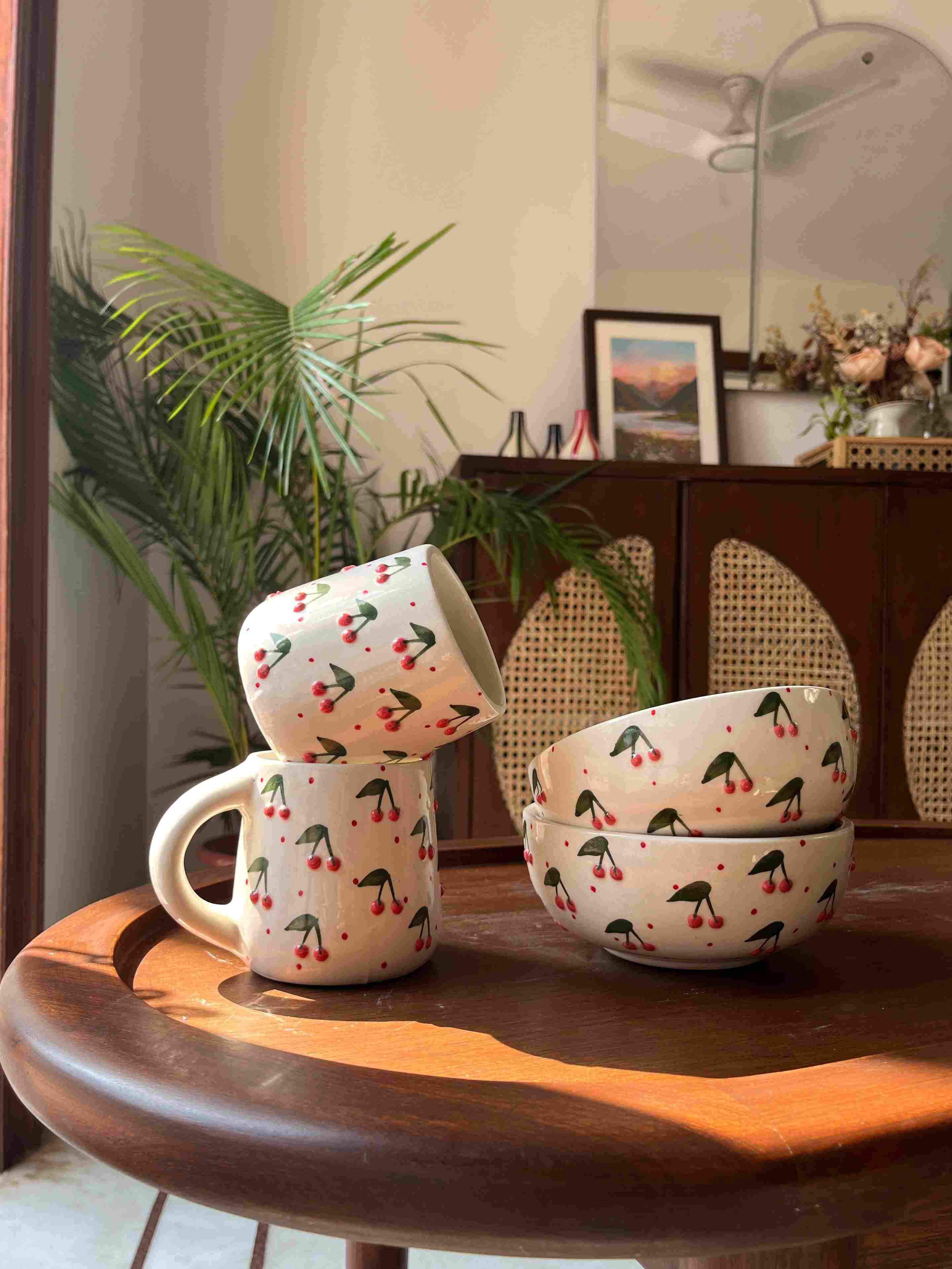 Berry Berry Mug and Bowl Set featuring two ceramic mugs and two matching ceramic bowls.