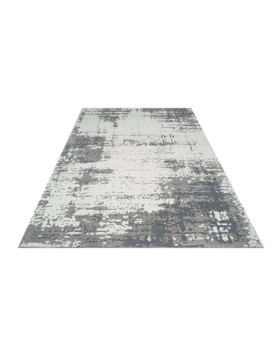 I N A V I luxury handmade rug by Cherom in soft ivory and grey New Zealand wool.