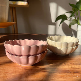 White and Pink Daisy ceramic flower bowls styled together for serving and table decor.