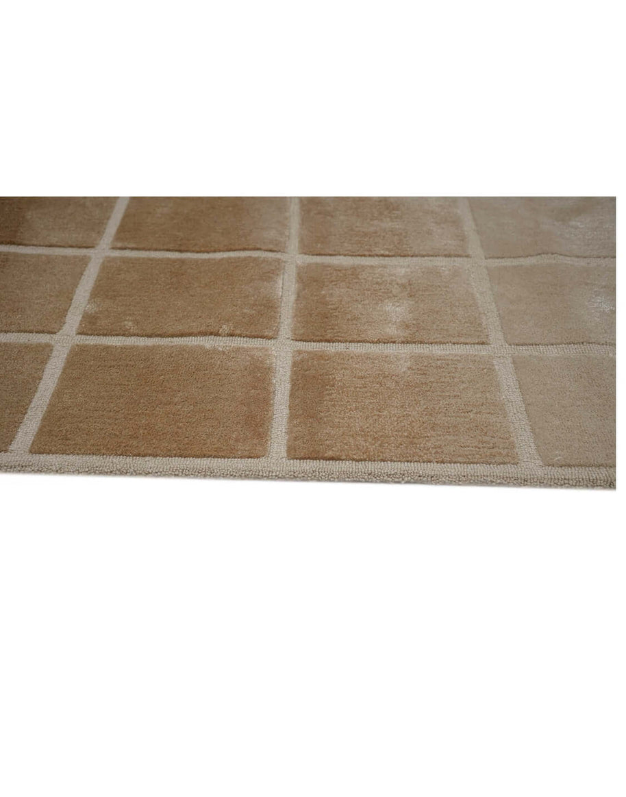 F A D E luxury modern rug by Cherom, a contemporary luxury rug with ombré shades of beige to brown.
