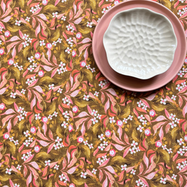 Decorative linen blend tablecover for 4 to 6 seater table styled with pink and white ceramic dishes
