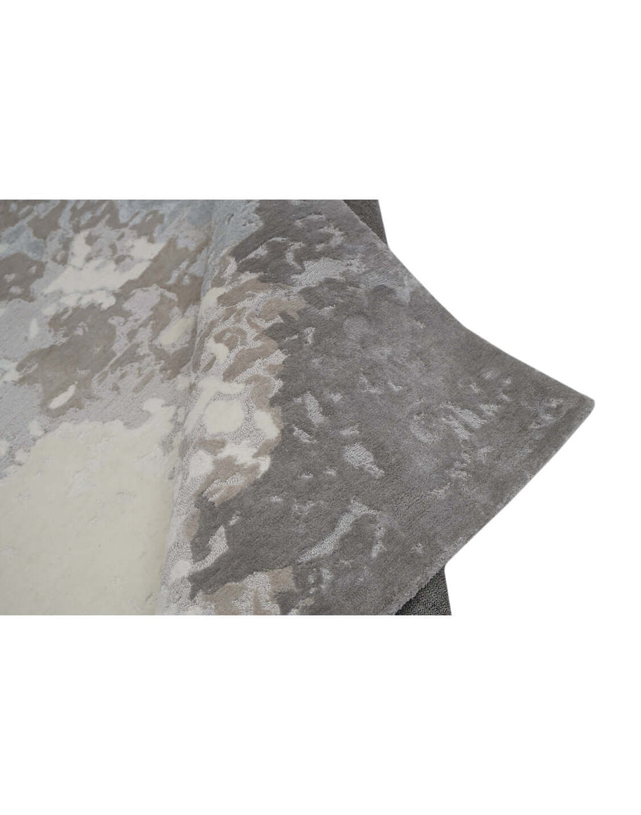 F R O S T luxury modern rug by Cherom, a contemporary rug in grey tones, perfect for modern decor.