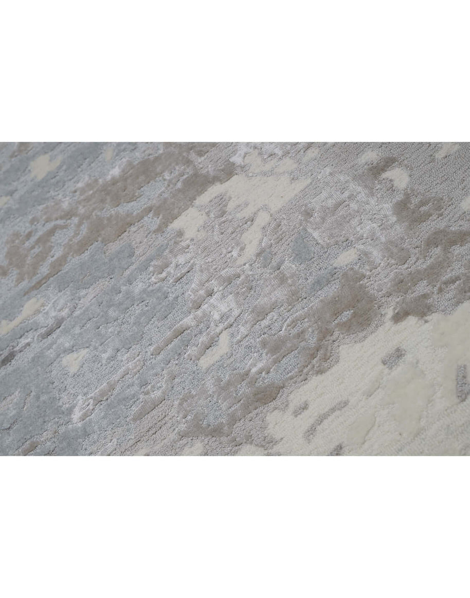 F R O S T luxury modern rug by Cherom, a contemporary rug with shades of grey in a serene design.