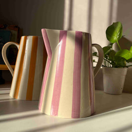 Striped ceramic jug vase from the Gelato Collection displayed as home decor.