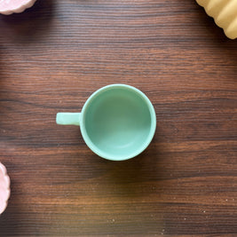 Pastel green ceramic cup for everyday sipping