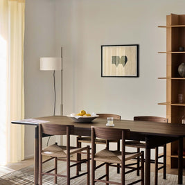 H O R I Z O N luxury modern rug by Cherom in a contemporary dining space with stylish furniture.