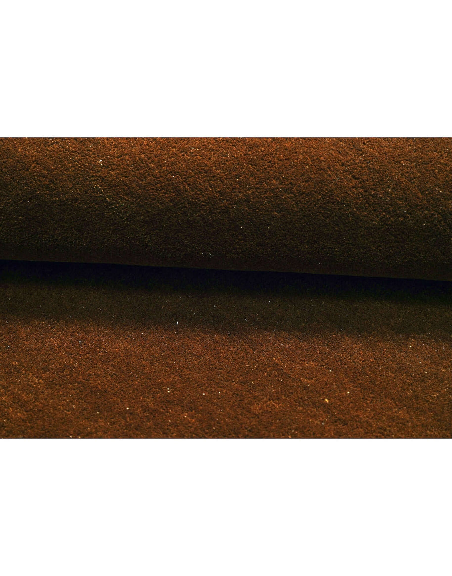 I C O N - A M B E R rug close-up showing rich brown New Zealand wool texture and high density tufting.