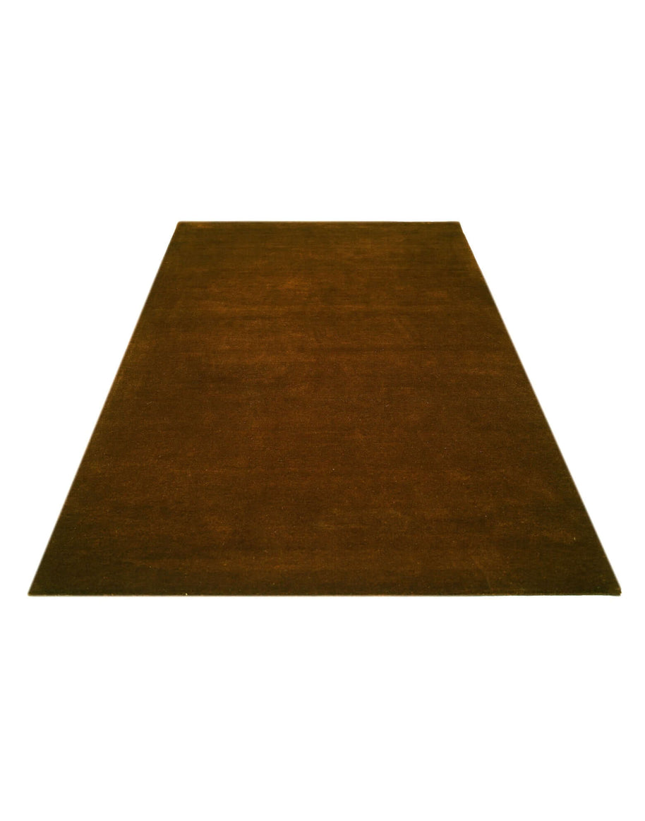 I C O N - A M B E R timeless rug made from New Zealand wool with dense tufting and hand-serged edges.