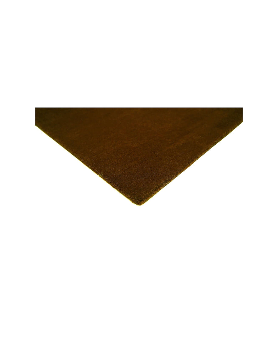 I C O N - A M B E R rug corner detail showing dense tufting and rich color in 100% New Zealand wool.