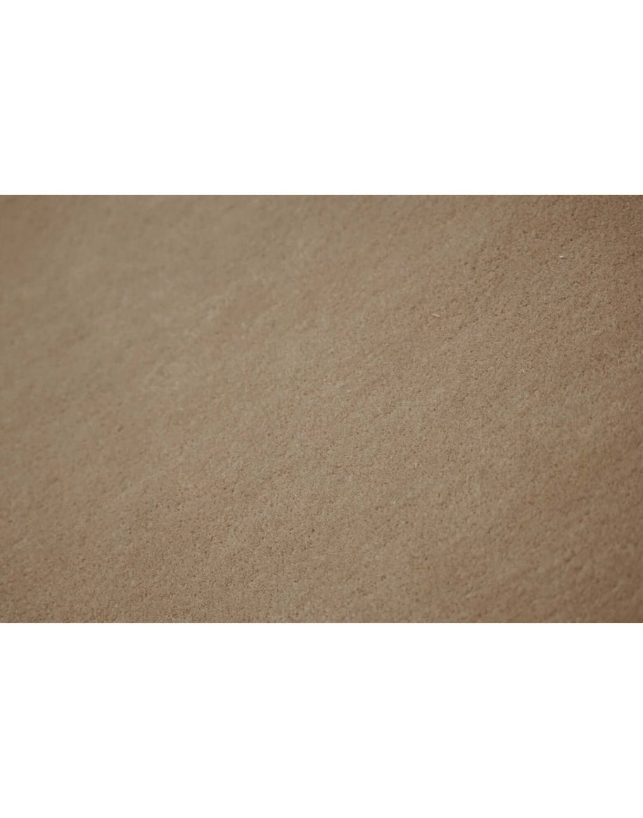 I C O N - L A T T E rug surface detail showcasing its fine New Zealand wool craftsmanship and soft texture.
