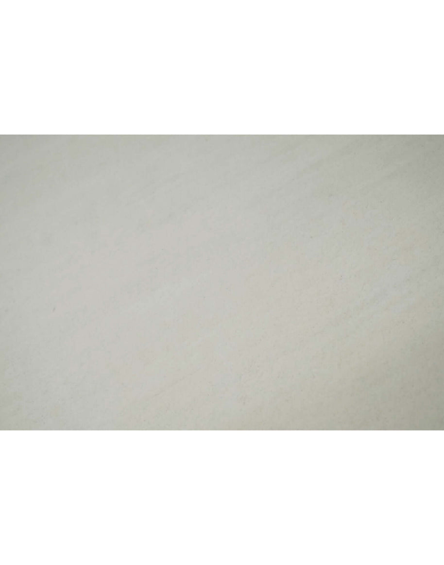 I C O N - M I L K rug texture in soft cream color, showcasing the quality of New Zealand wool craftsmanship.