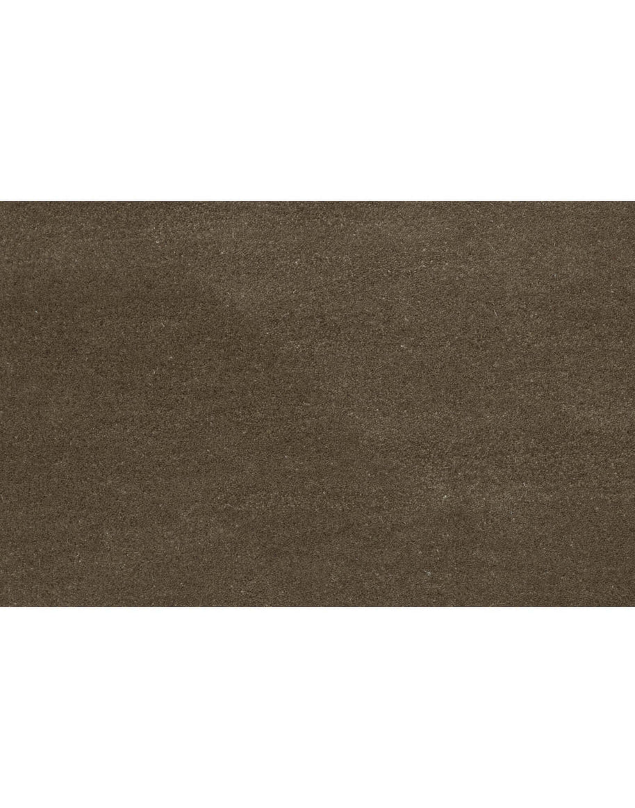 I C O N - T R U F F L E rug in a rich brown color, made from 100% New Zealand wool, showcasing high-density tufting.