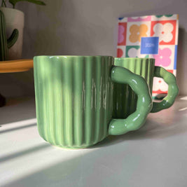 Ribbed green ceramic Kiwi Mug with ergonomic curved handle