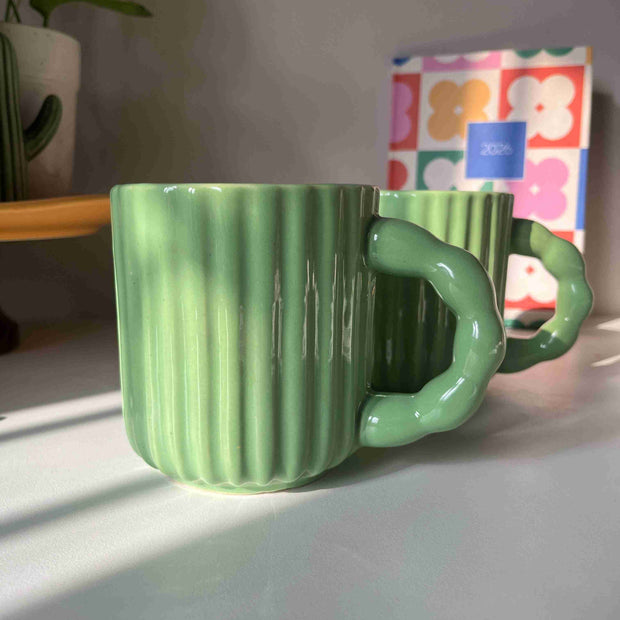 Ribbed green ceramic Kiwi Mug with ergonomic curved handle