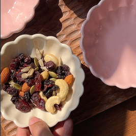 Loom & Bloom tray and bowl set styled on a dining table for serving snacks and desserts.