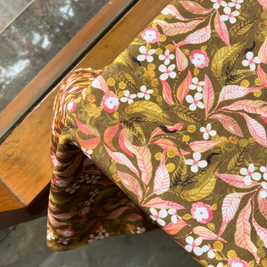Close-up of botanical print on Folklore tablecover