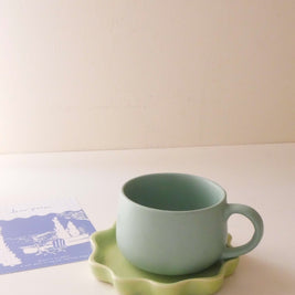 Green Tulip ceramic cup in pastel green finish