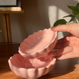 Pink Daisy ceramic bowl styled on a table for everyday serving and decor.