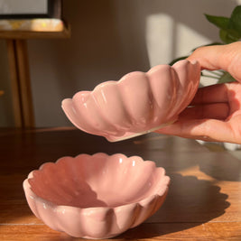 Side view of the Pink Daisy ceramic bowl showing its flower-inspired silhouette.