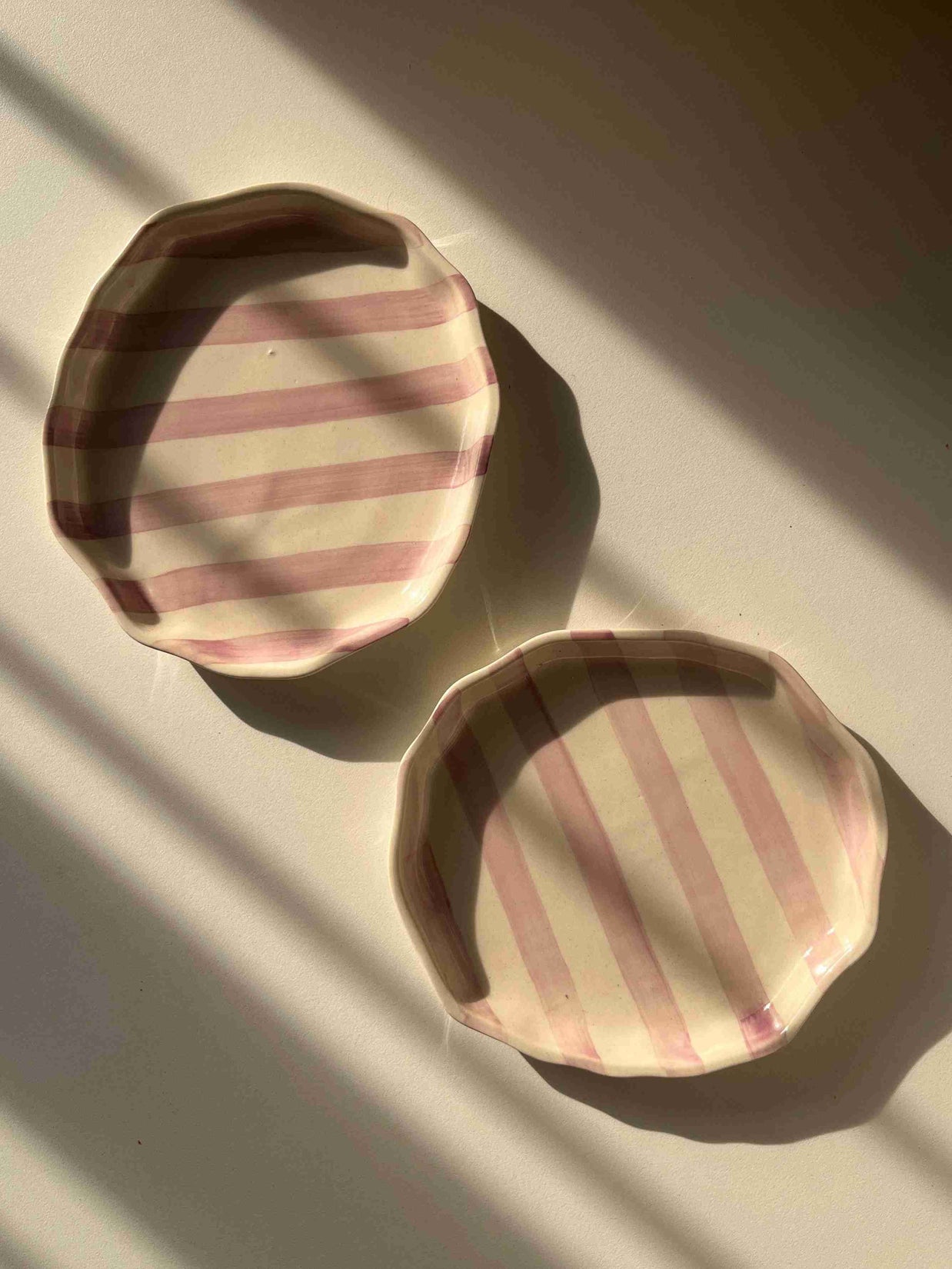 Pair of purple Taffy ceramic plate with hand-painted lavender stripes and glossy finish