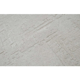 S C U L P T E D - U R B A N A luxury modern rug by Cherom, showcasing soft grey tone and delicate texture.