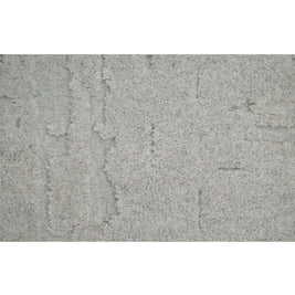 S C U L P T E D - U R B A N A luxury modern rug by Cherom featuring a soft grey tone and textured design.