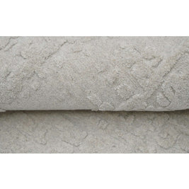 S C U L P T E D - U R B A N A luxury modern rug by Cherom - soft grey with textured detail, ideal for contemporary interiors.