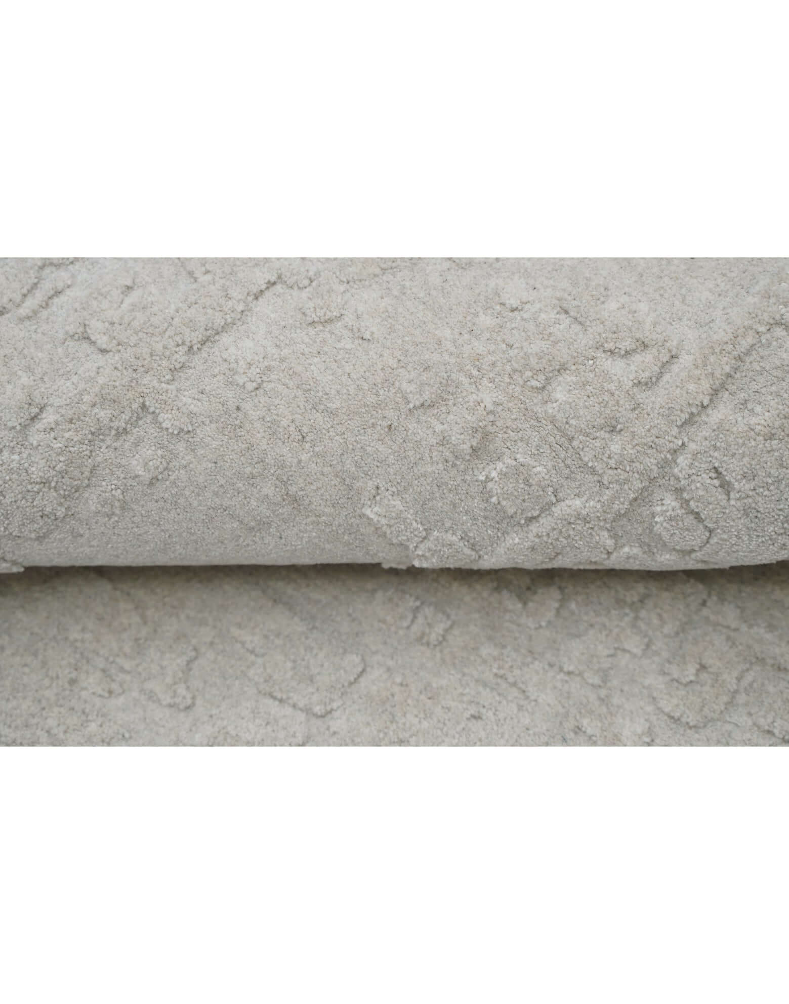 S C U L P T E D - U R B A N A luxury modern rug by Cherom - soft grey with textured detail, ideal for contemporary interiors.