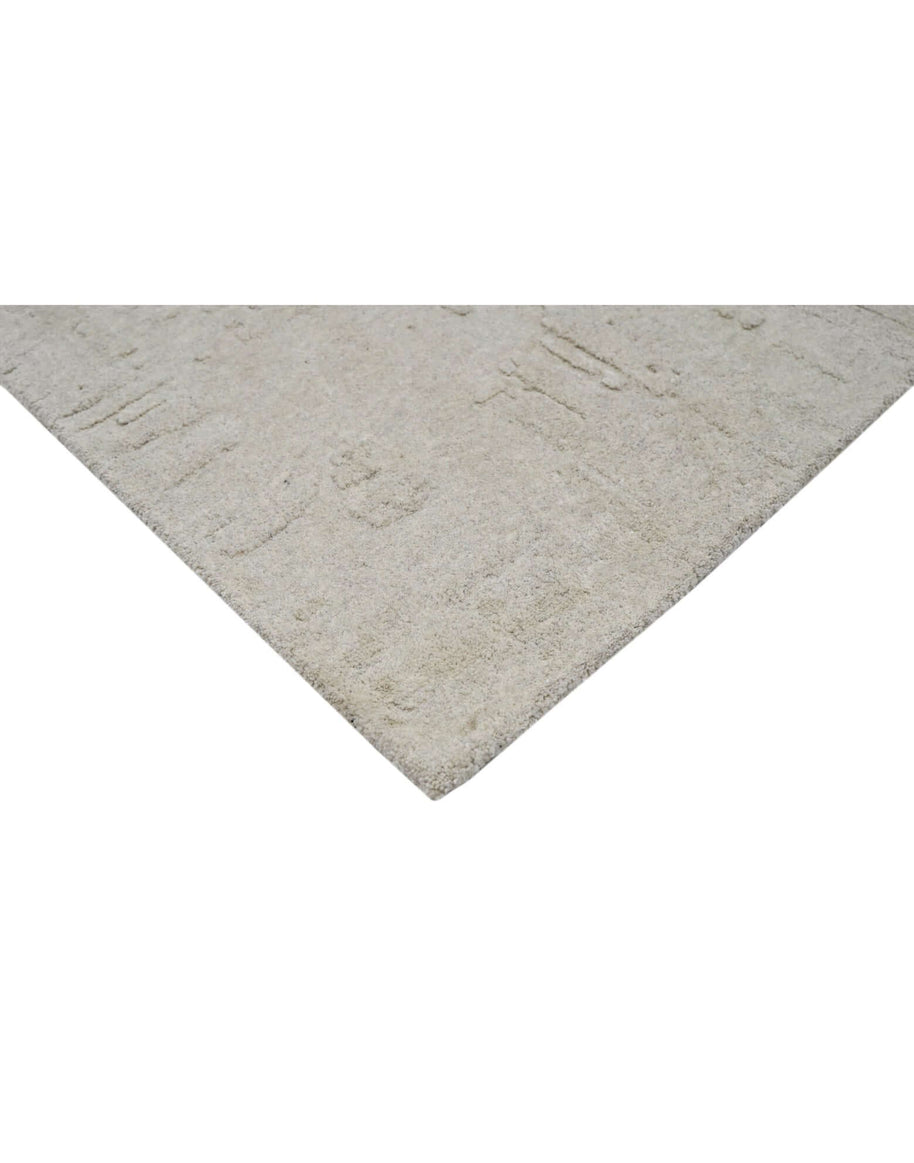 S C U L P T E D - U R B A N A luxury modern rug by Cherom, featuring soft grey tone and textured design.