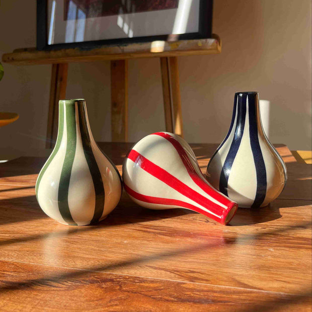 Set of three small striped flower vases designed for styling shelves and tables.