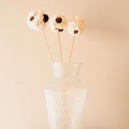 Handmade white sola flower ball sticks used for aesthetic home decor and elegant interior styling